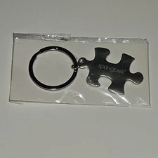 Springbok Silver Tone Brushed Metal Jigsaw Puzzle Piece Keychain NEVER USED
