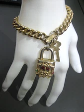 VINTAGE GOLD TONE CURB CHAIN BRACELET WITH CABLE CAR LOCK CHARM AND KEY