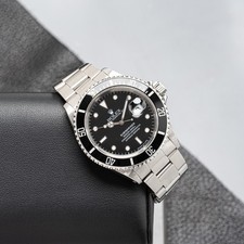 Rolex Submariner 16610 Silver Oyster Bracelet with Black Bezel