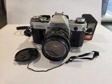 Canon AE-1 SLR Film Camera With 50mm Lens 52 Tiffen Sky DeJur Flash - Read Desc