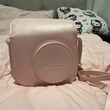 Camera Case Pouch with Strap and with the camera in. Side the case
