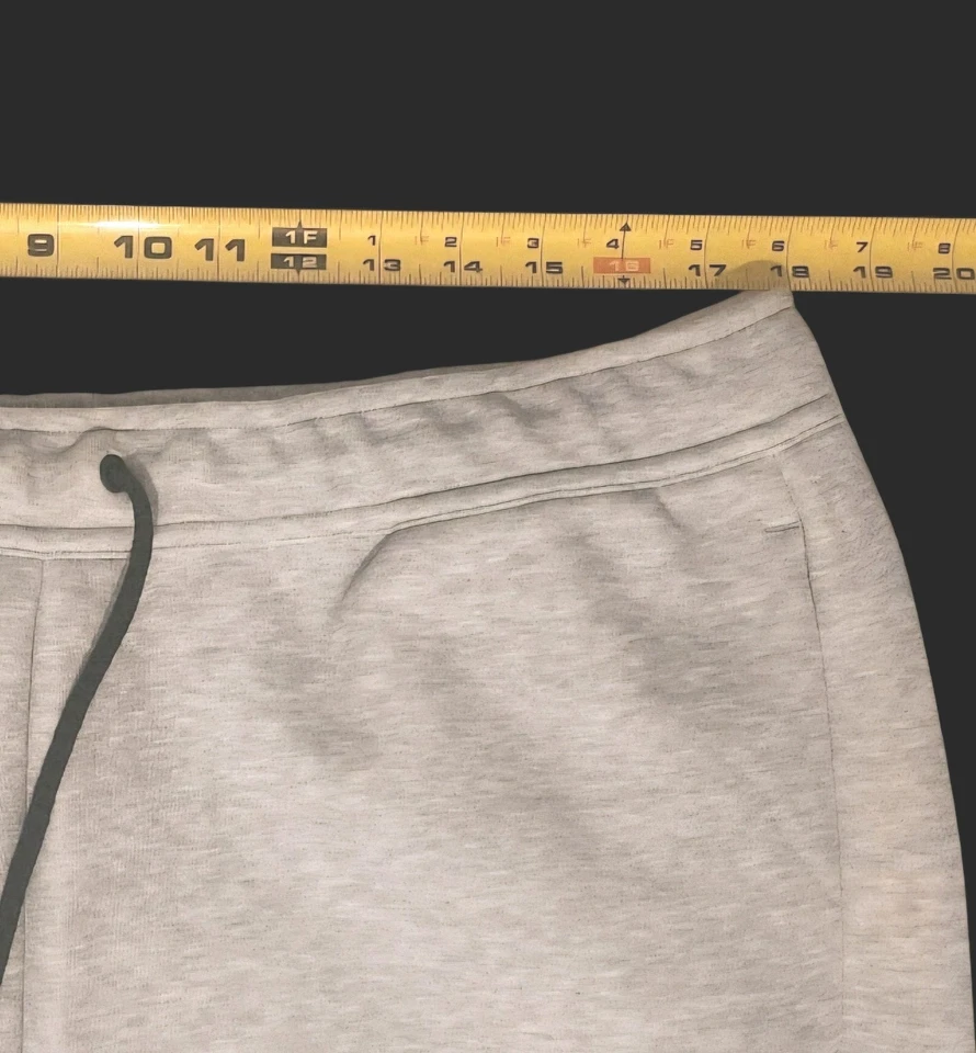 Pantalones deportivos para hombre Nike Tech polar gris jaspeado/negro talla XLarge Foto 4 de 4