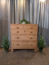 Antique Victorian stripped pine chest of drawers with original working key