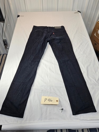 Pantalones de mezclilla elásticos negros Levis 511 para hombre 31x32 usados en excelente estado - Imagen 11 de 16