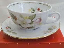 Tea cup & saucer, Bavarian porcelain, December Flower series, Avon, boxed, 1960s