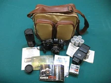Konica Ft-1 Motor Camera Outfit 35mm SLR 2 Lens Sunpak Flash Fuji Film Coast Bag