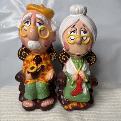 Vintage Blow Mold Grandma And Grandpa In Rocking Chairs Piggy Bank Knitting Pipe