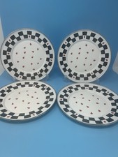 The golden  rabbit ll by Jean Wilkes  1999 lady bug enamel plates 9”diam set 4