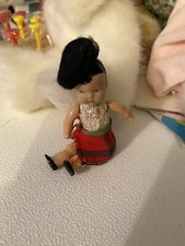 celluloid Doll 3 inches tall with Scottish skirt and beret