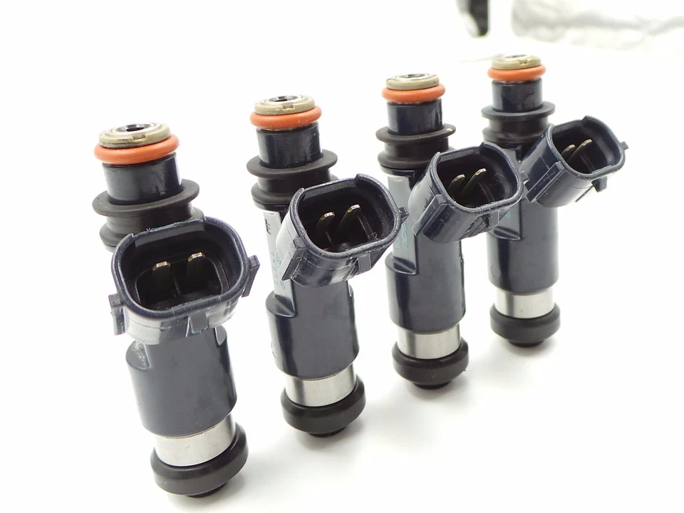 Juego de 4 inyectores de combustible originales Denso Mitsubishi Galant Eclipse 2,4 L enviados hoy Foto 2 de 3