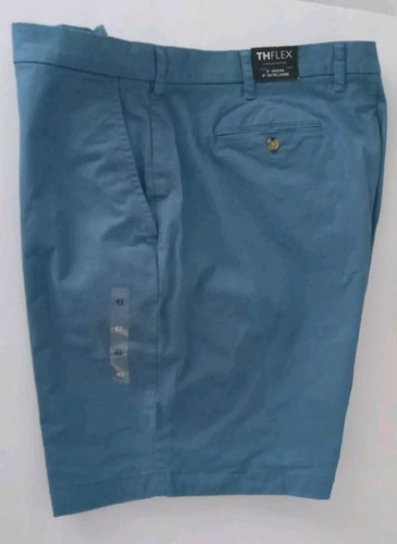 Pantalones cortos Tommy Hilfiger THFlex para hombre 42" x 9" entrepierna frente plano azul nuevos con etiquetas
