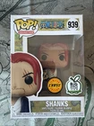 Funko Pop! #939: One Piece Shanks (Chase) Big Apple Exclusive Light Box Damage