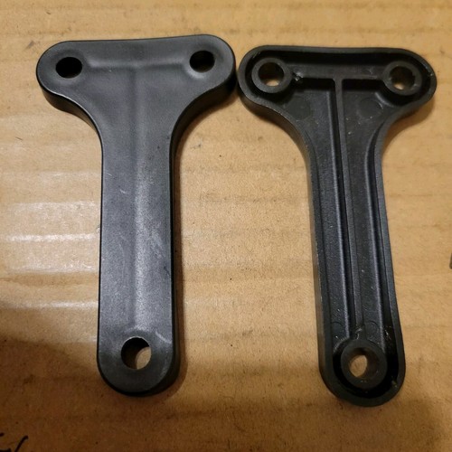 SET OF TWO (2) SAFARILAND .250 "T" SPACERS FOR SAFARILAND HOLSTER UNUSED