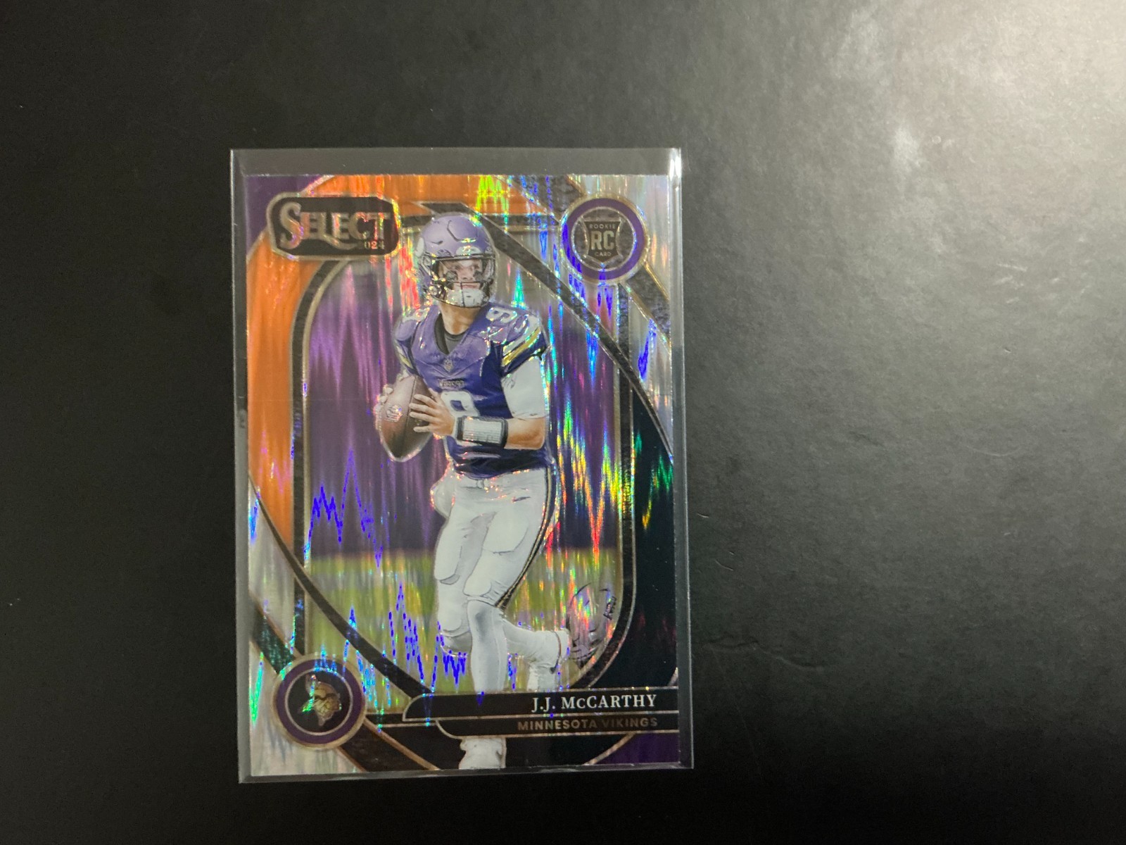 2024-25 Panini Select #246 JJ McCarthy - Orange Black Prizm Shock (RC) Vikings