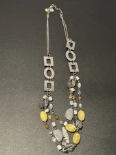 Multicolored beads necklace by Lia Sophia; yellow, silver and crystal.