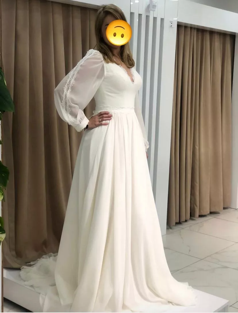 Robe de mariée comme NEUVE dans sa housse de protection T38/40