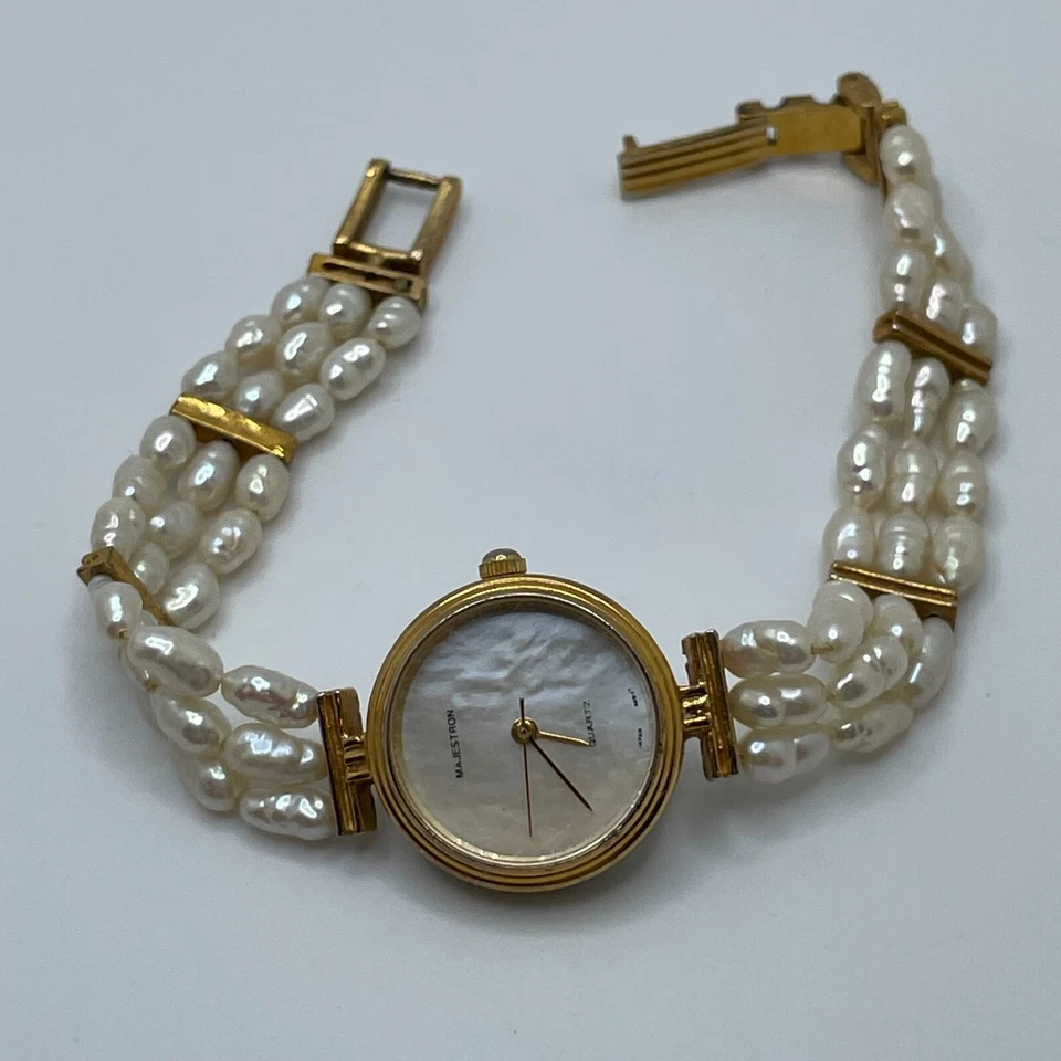 Reloj Majesti Mujer Majestron 22mm Estuche Imperfecto Imitación Perla Banda Cuarzo Analógico Foto 2 de 4