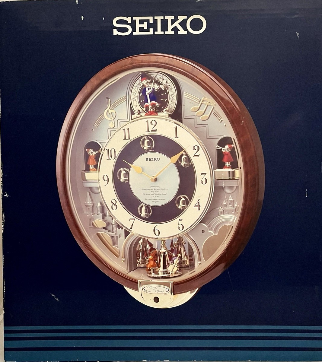 Seiko Melodies in Motion Musical Wall Clock Plays 7 Beatles Songs