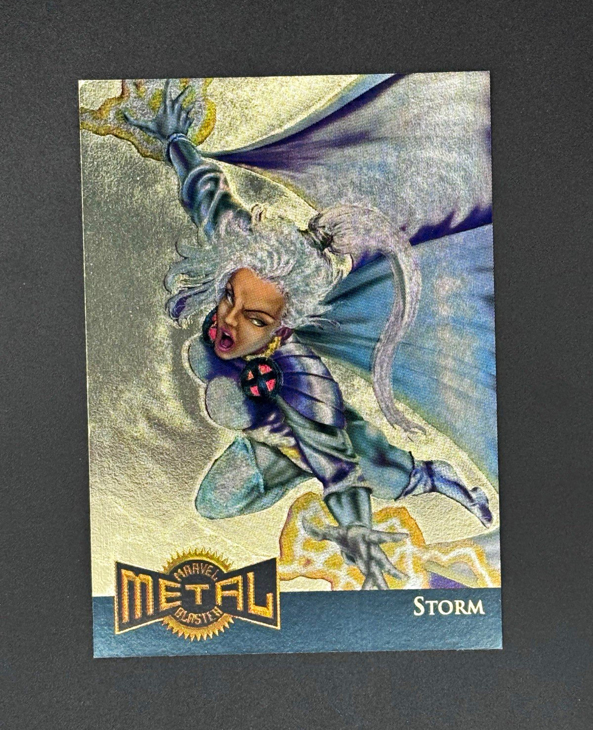Storm #13 Marvel 1995 Metal Blaster trading card — raw and PSA graded price guide