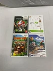 Donkey Kong Country Returns, Wii fit, Ghostbusters, and Up Nintendo Wii Game Lot