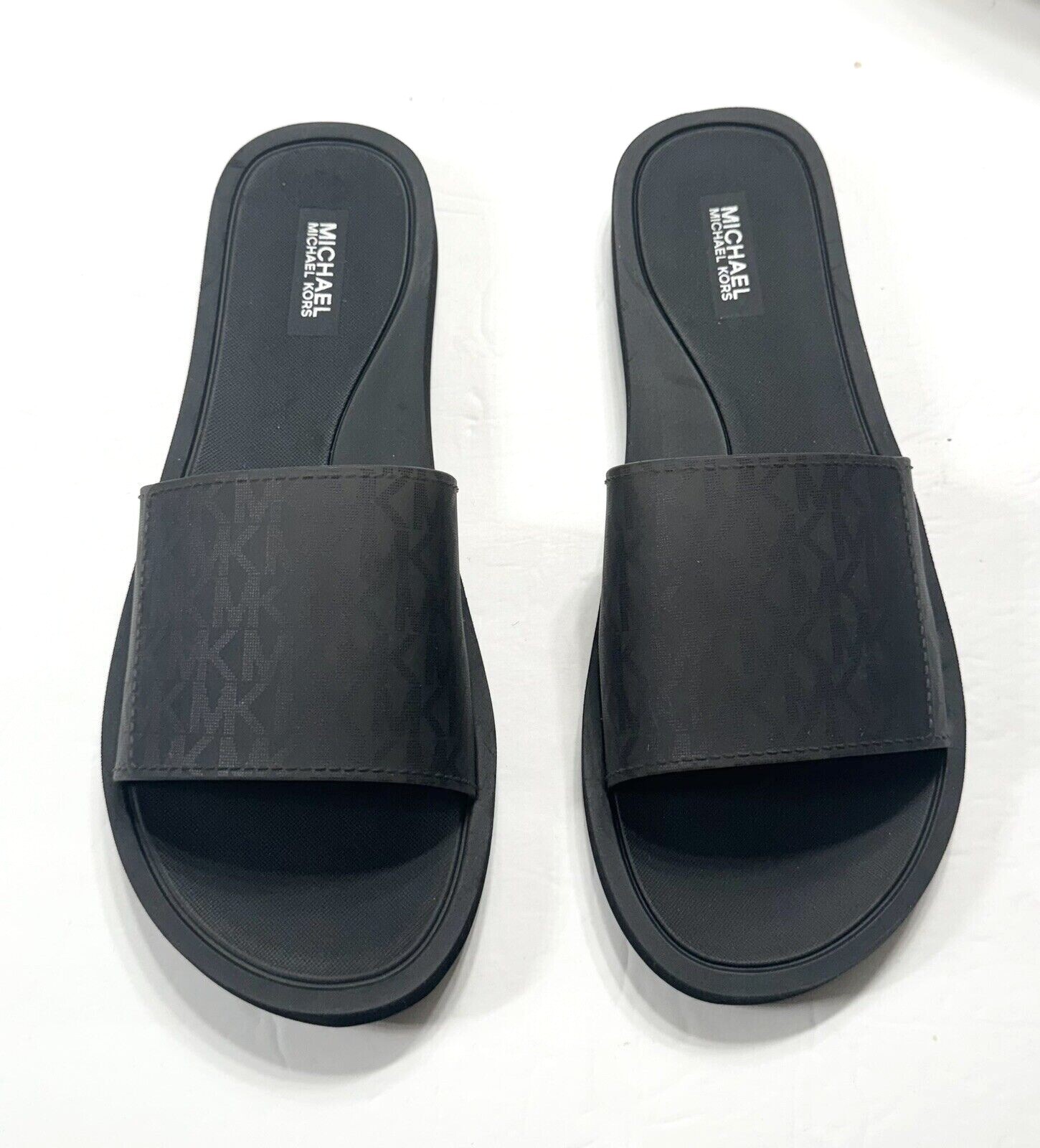 Женские босоножки MK Michael Kors Slide черного цвета 11490₽