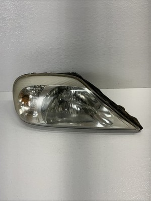 00-05 Mercury Sable Headlamp Assembly Right Passenger Side *DEBRIS INSIDE LENS