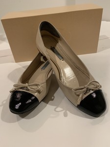 prada cap toe