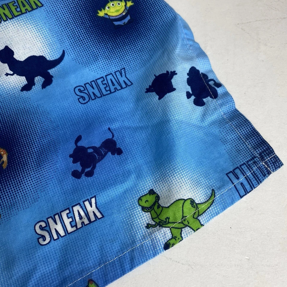 Tela artesanal Disney/Pixar Toy Story hoja superior 44,5" x 58,5" azul leñoso Buzz Rex Foto 4 de 4