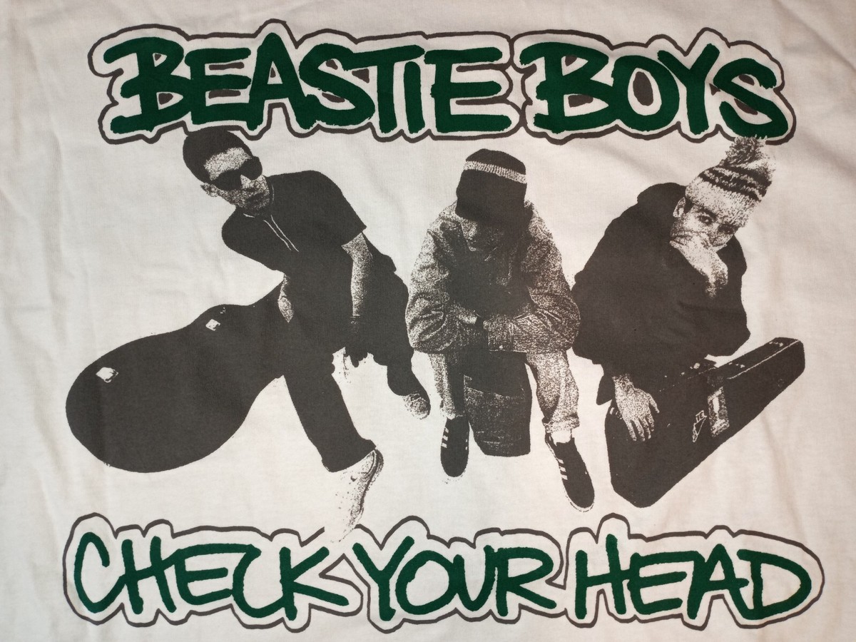 NEW BEASTIE BOYS CHECK YOUR HEAD SHIRT W TAGS.SIZE 2XL..25 PITS