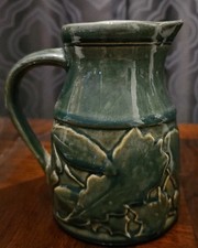 Rowe Pottery Green Pitcher w/Maple Leaves  7"  high