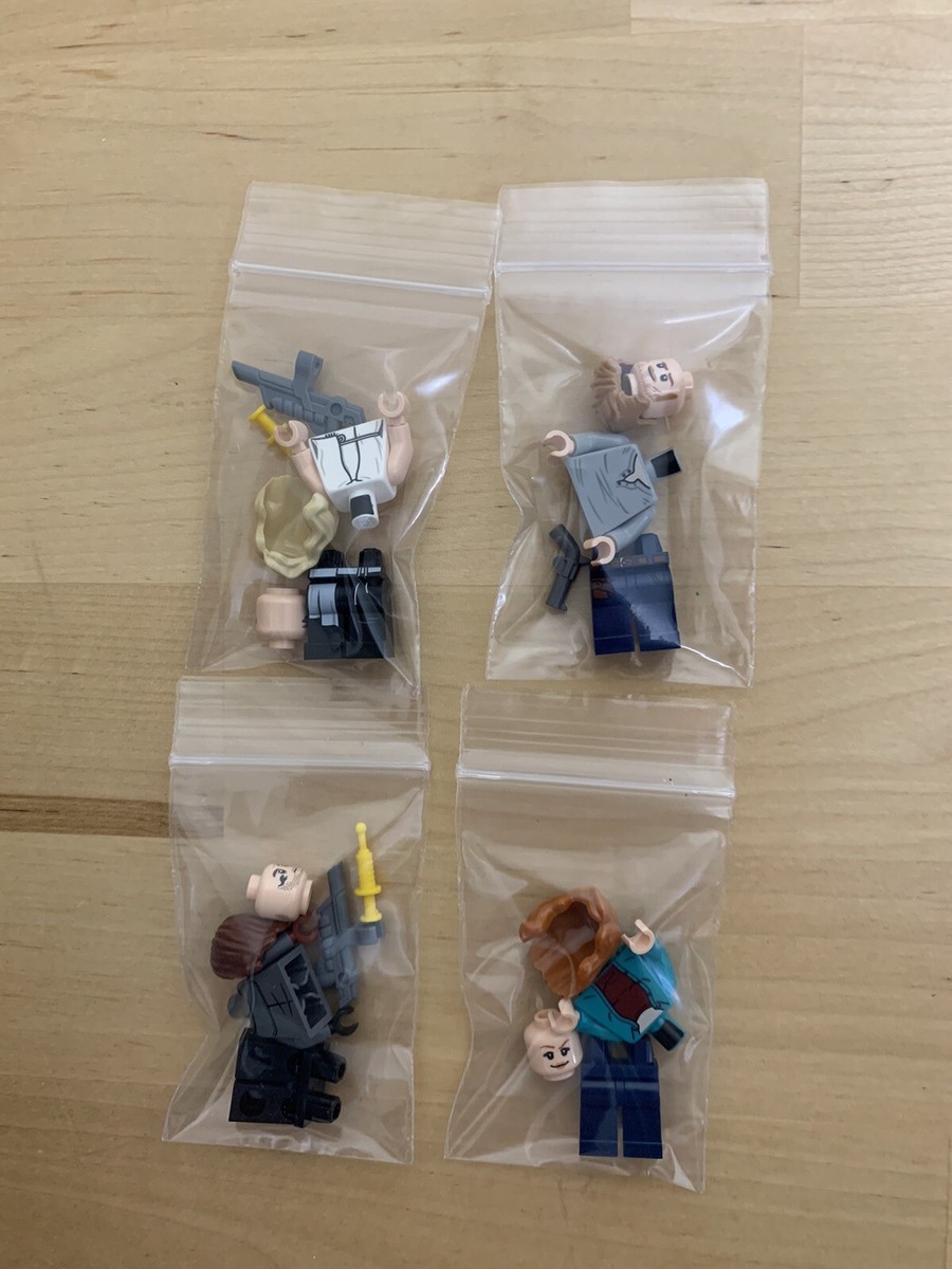 All 4 minifigures from LEGO 76948: Owen, Claire, Rainn