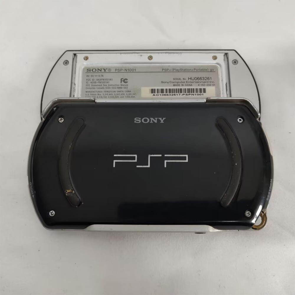Sony PSP GO console Black with Charger PSPN1001 screen with protect