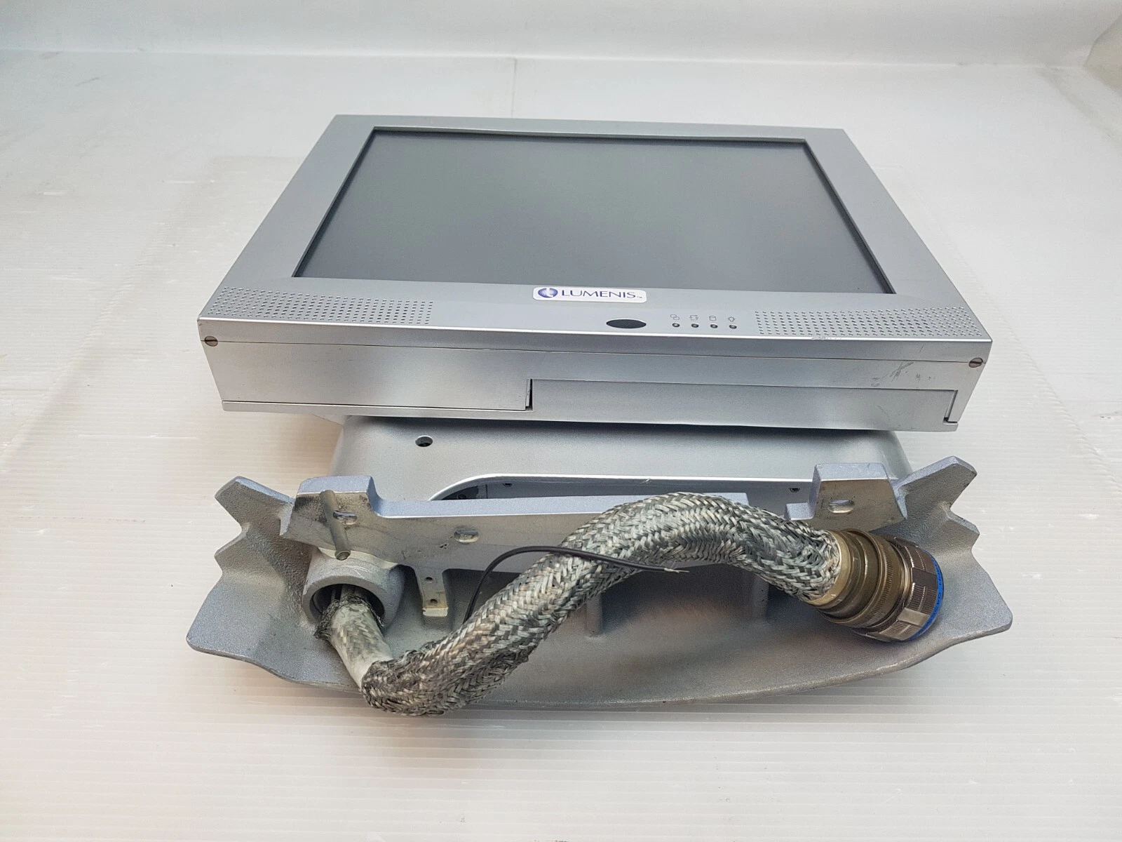 Lumenis One monitor from the front with Lumenis logo, arm and braided cable