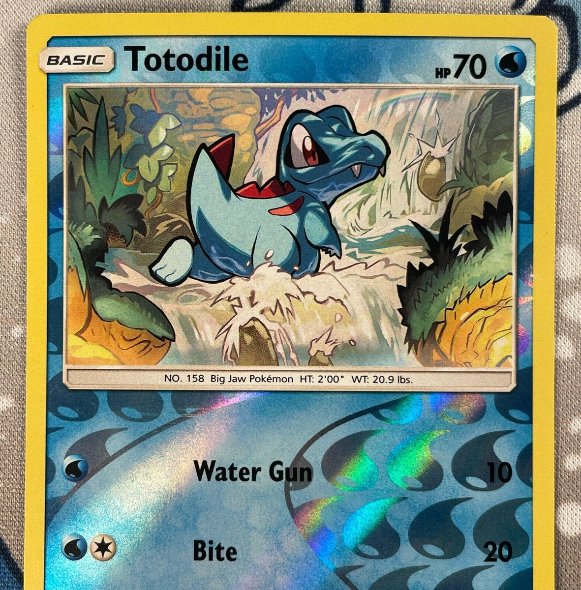 Totodile 18/73 Reverse Holo Sun & Moon Shining Legends Pokemon