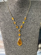 Gold tone and amber tone collar necklace