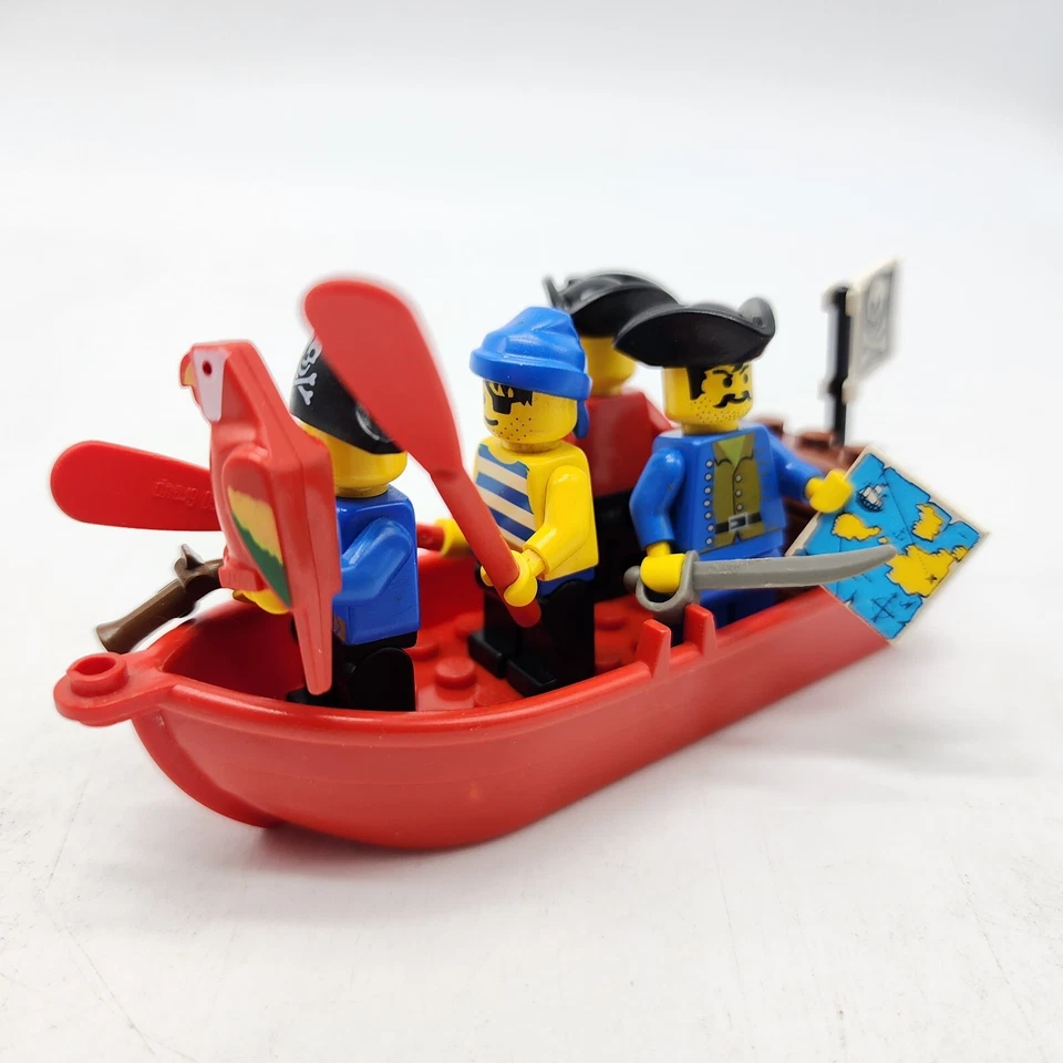 Lote De Colección Lego De 4 Minifiguras Piratas Con Barco Rojo Remos Loro Espada Cofre Foto 4 de 4