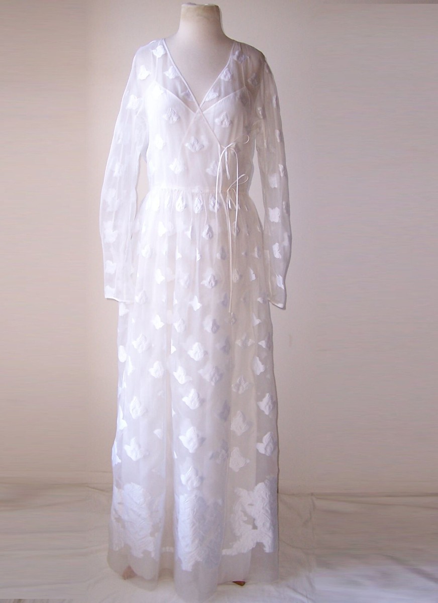 white sheer embroidered dress Sheer Embroidered Dress With Intricate Floral Pattern
