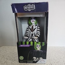 Beetlejuice Phone and Controller Holder Accessory. Box Is In Fair Condition
