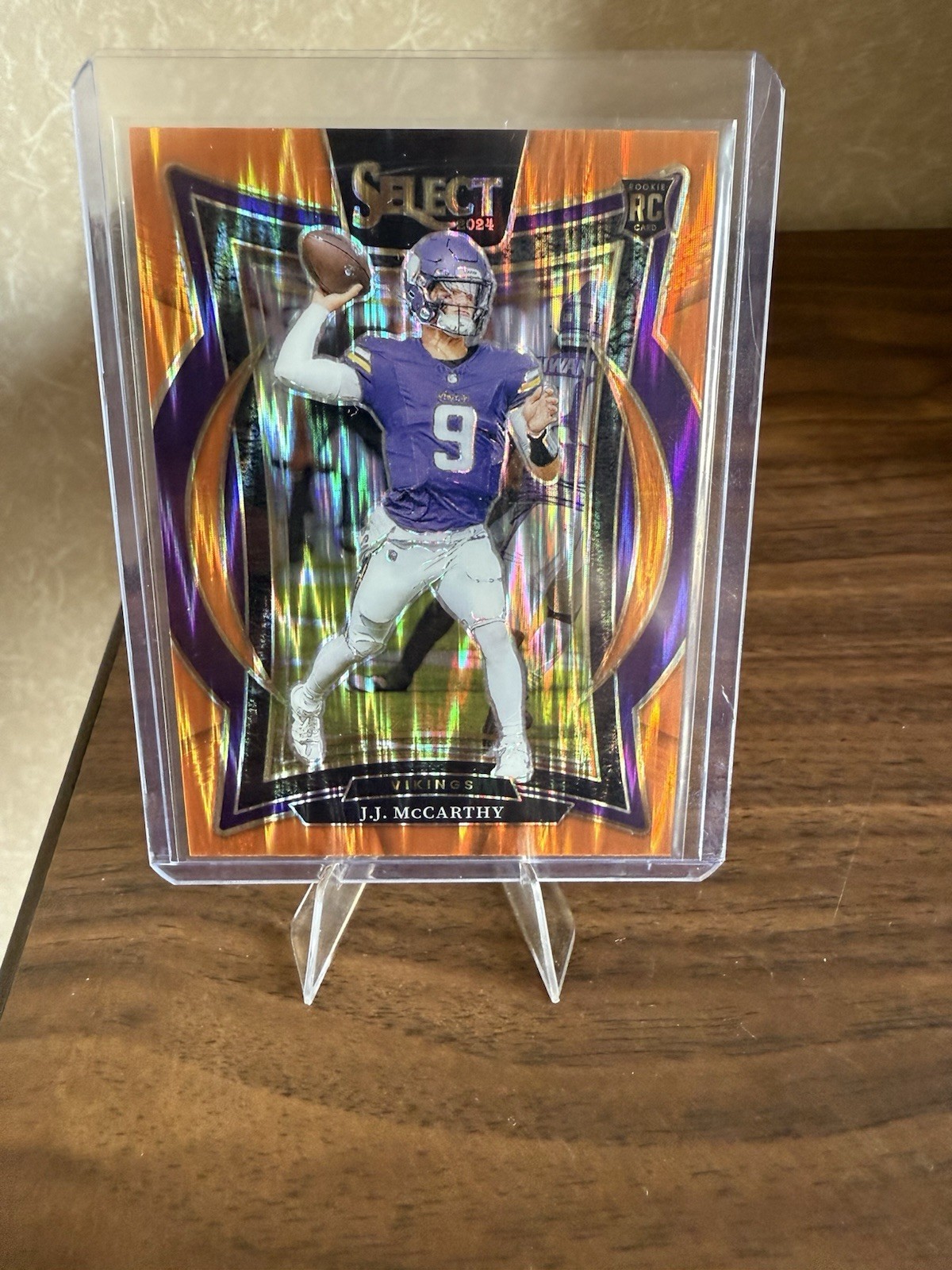 2024 Panini Select - Concourse J.J. McCarthy #24 Orange Shock Prizm (RC) /499