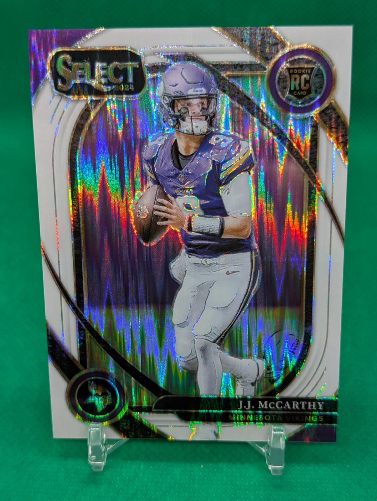 J.J. McCarthy /199 Rookie 2024 Panini Select White Prizm Shock #246 RC Vikings