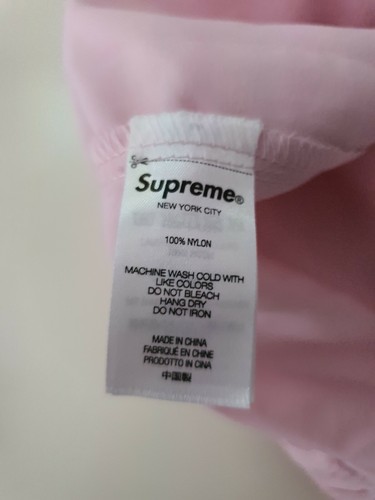 FW21 Supreme Warm Up pantaloni rosa pallido pantaloni da pista L pantaloni grandi Supplex nuovi - Foto 12 di 12