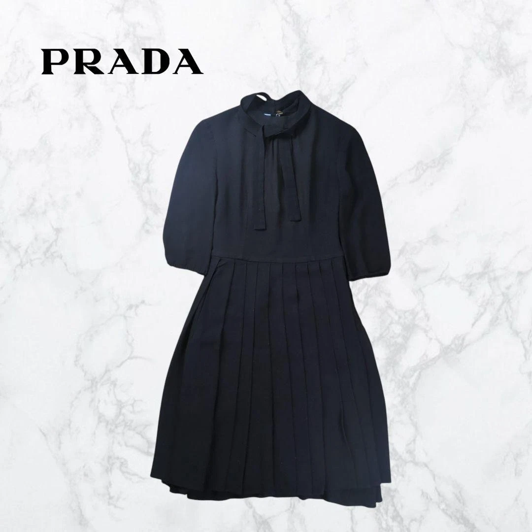 Raro abito plissettato Prada con fiocco