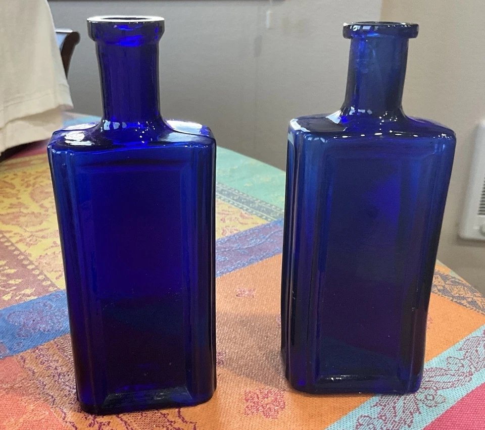 Dos botellas de tónico para el cabello Boswell & Warners Impresionante Foto 2 de 4