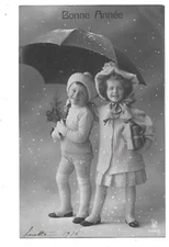 Old postcard children under a snow umbrella 1916 wishes