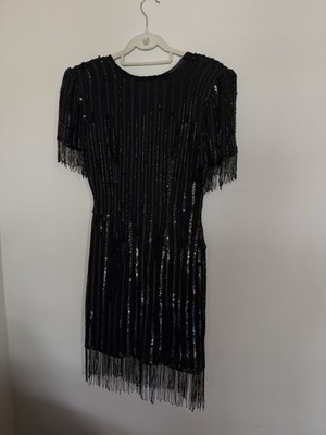 True vintage Stenay black sequin dress with fringe detail . 100% silk size 4