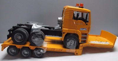 bruder flatbed truck with bulldozer yellow