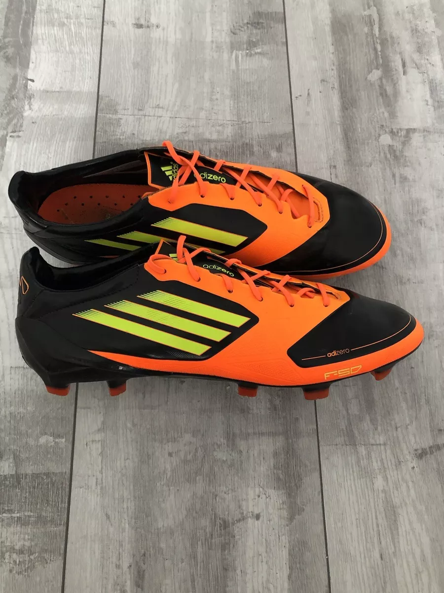 Botas de fútbol profesional Adidas F50 Adizero FG naranja negras