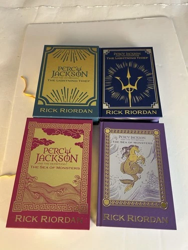 Percy Jackson Lightning Thief and Sea of Monsters Deluxe Edition 2 Book Lot