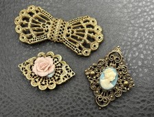 VTG Lot Of 3 Gold Tone 2 1928 Filigree Brooch...