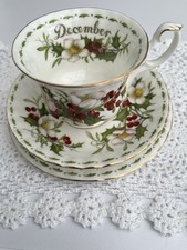 Royal Albert Christmas Rose Trio.Cup , Saucer, and side Plate Set. Bone China